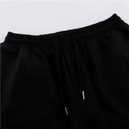 Pantalones Techwear Con Bolsillos De Cremallera Y Cintas Ligero